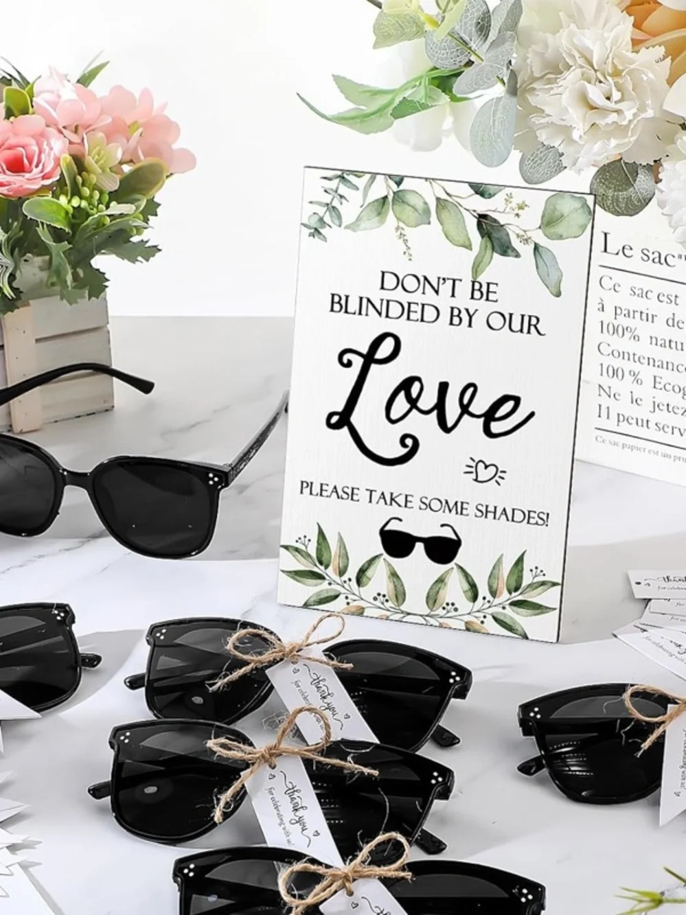 “Don’t be blinded by our love” wedding sign reception decor